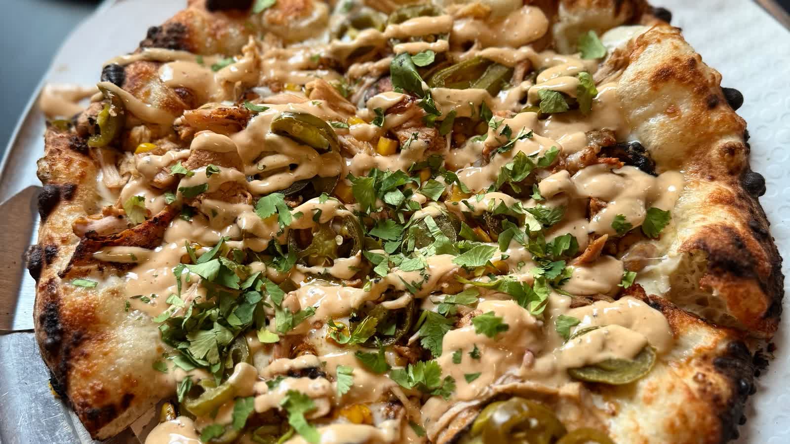 Wood-fired specialty pizza at Timber Wood Fired in Lincoln, New Hampshire